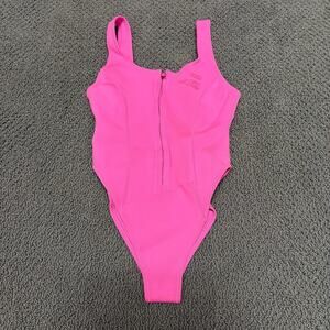 Pink one piece swimsuit skims